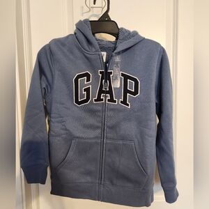 NWT. GAP kids zip up hoodie. Blue. Size large.